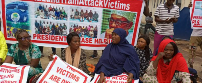 Families of train attack victims protest in Abuja