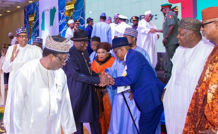 Buhari confers service awards on Jonathan, others